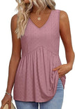 Woman wearing a light pink textured V-neck peplum top