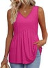 Woman wearing a pink-red textured V-neck peplum top